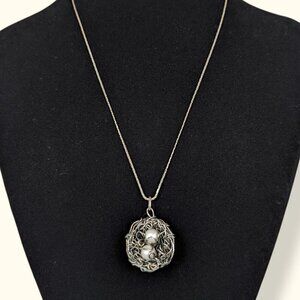 V. Bird's Nest Pearl Egg Necklace